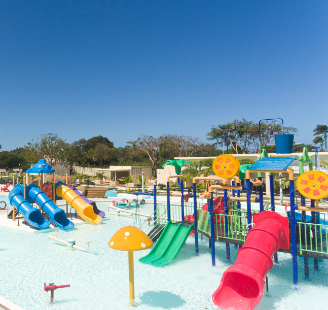 a water park with slides and trees