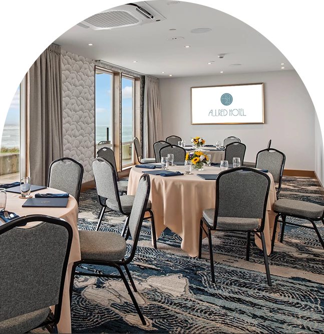 a room with tables and chairs