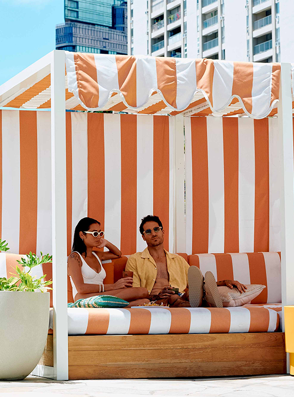 a man and woman sitting on a couch