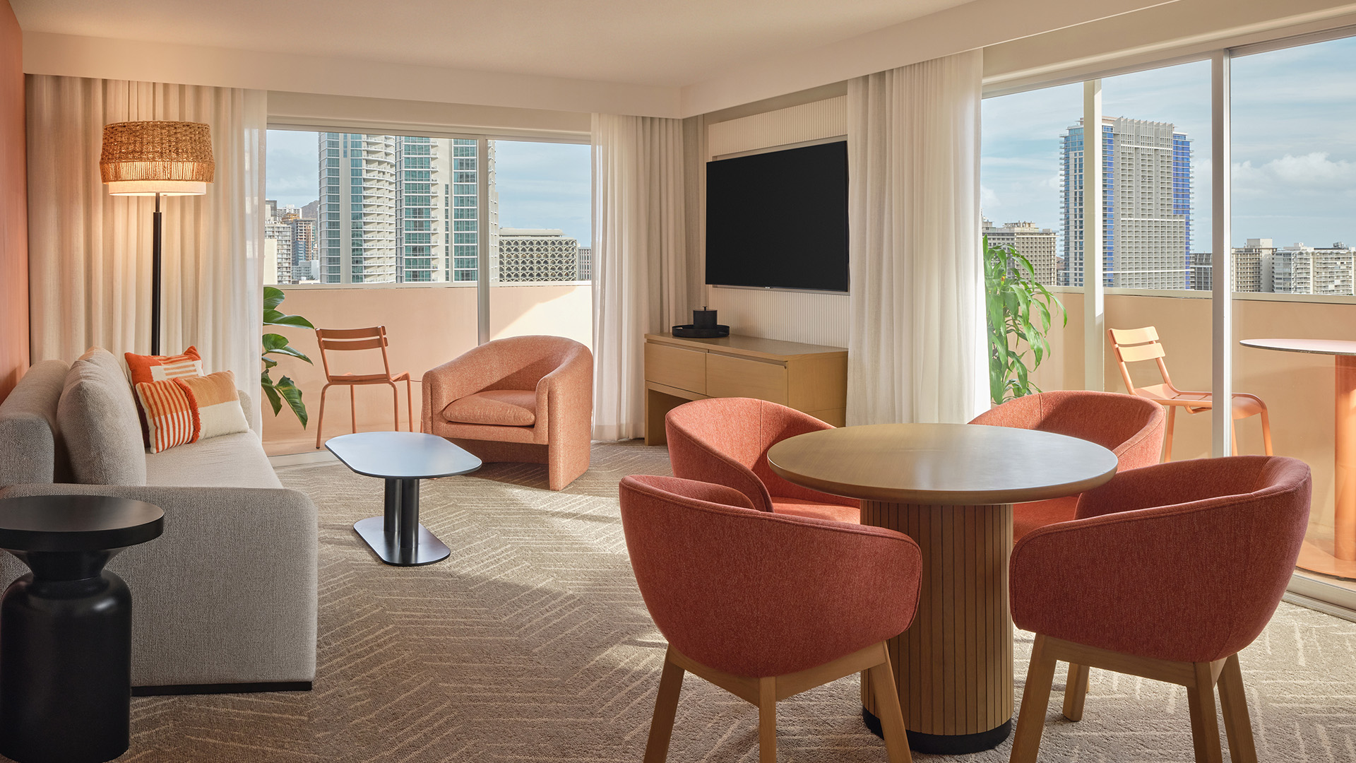 a room with a television and chairs