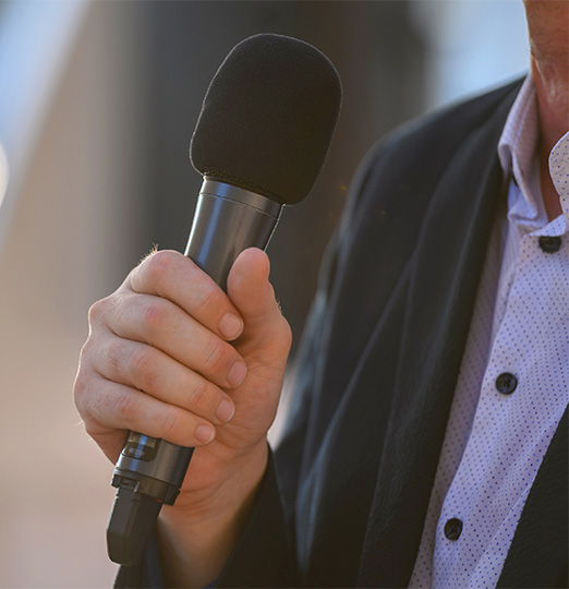 a person holding a microphone