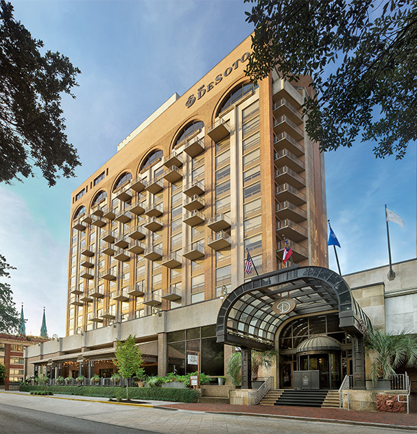 a large building with a glass front entrance