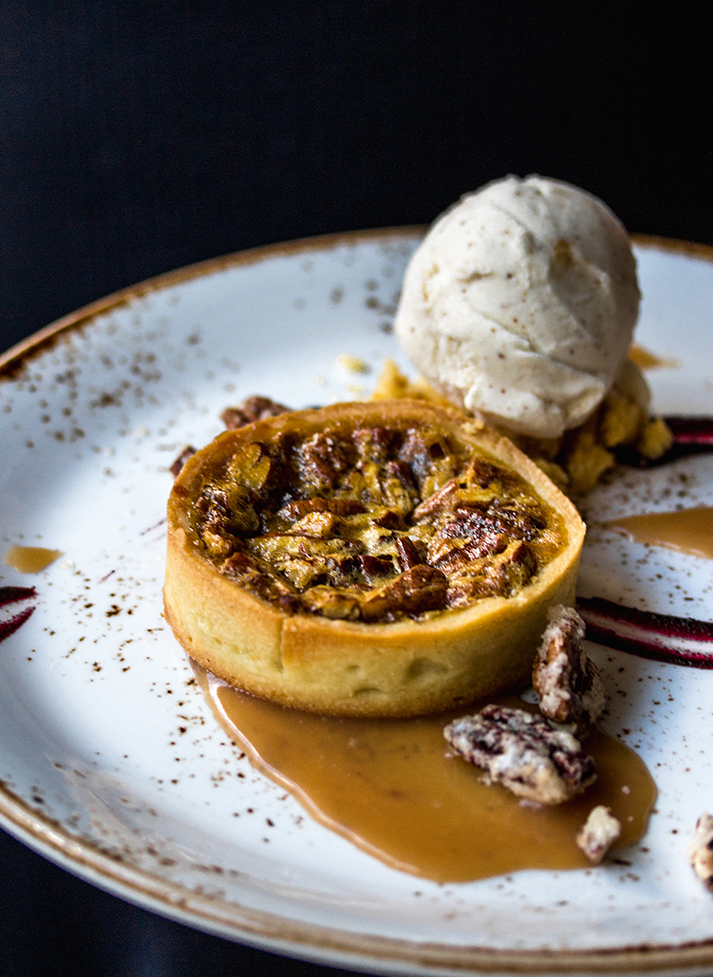 a plate of food with a scoop of ice cream
