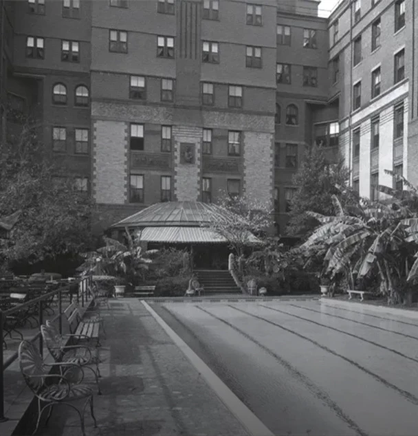 a pool in front of a building