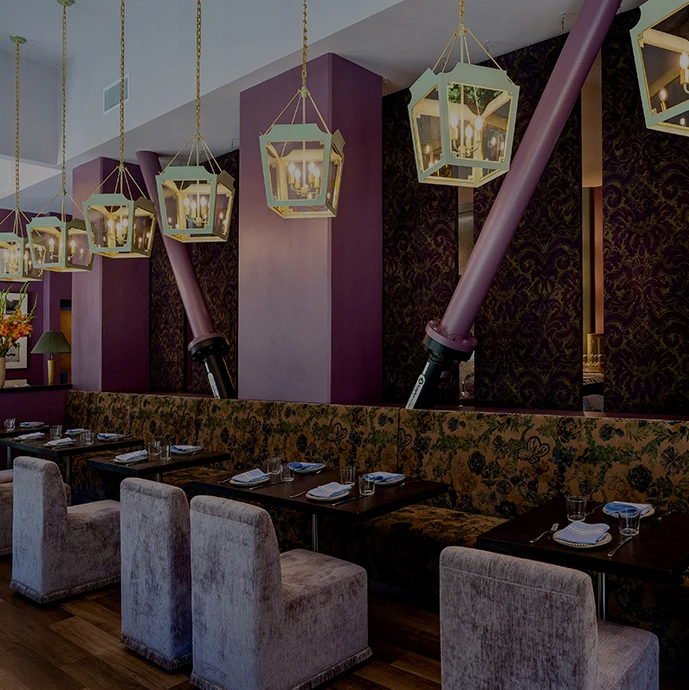 a restaurant with tables and chairs