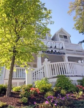 a white building with a white railing
