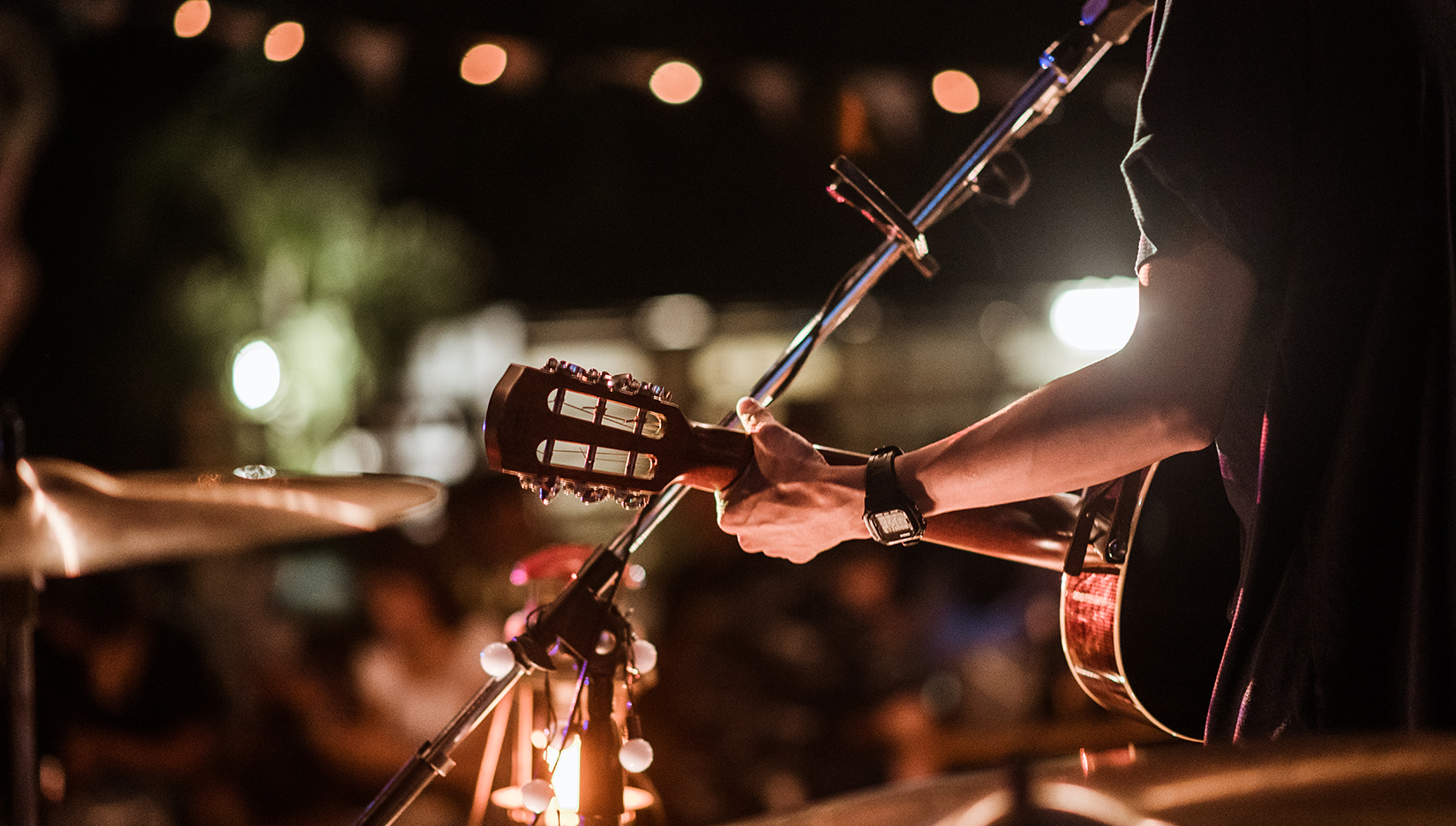 a person playing a guitar