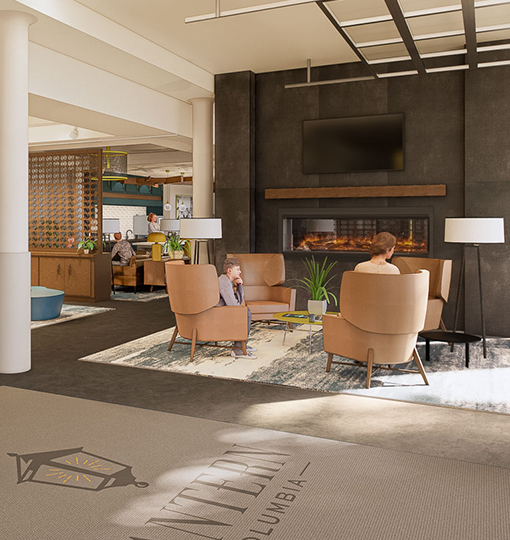 a group of people sitting in a room with a fireplace