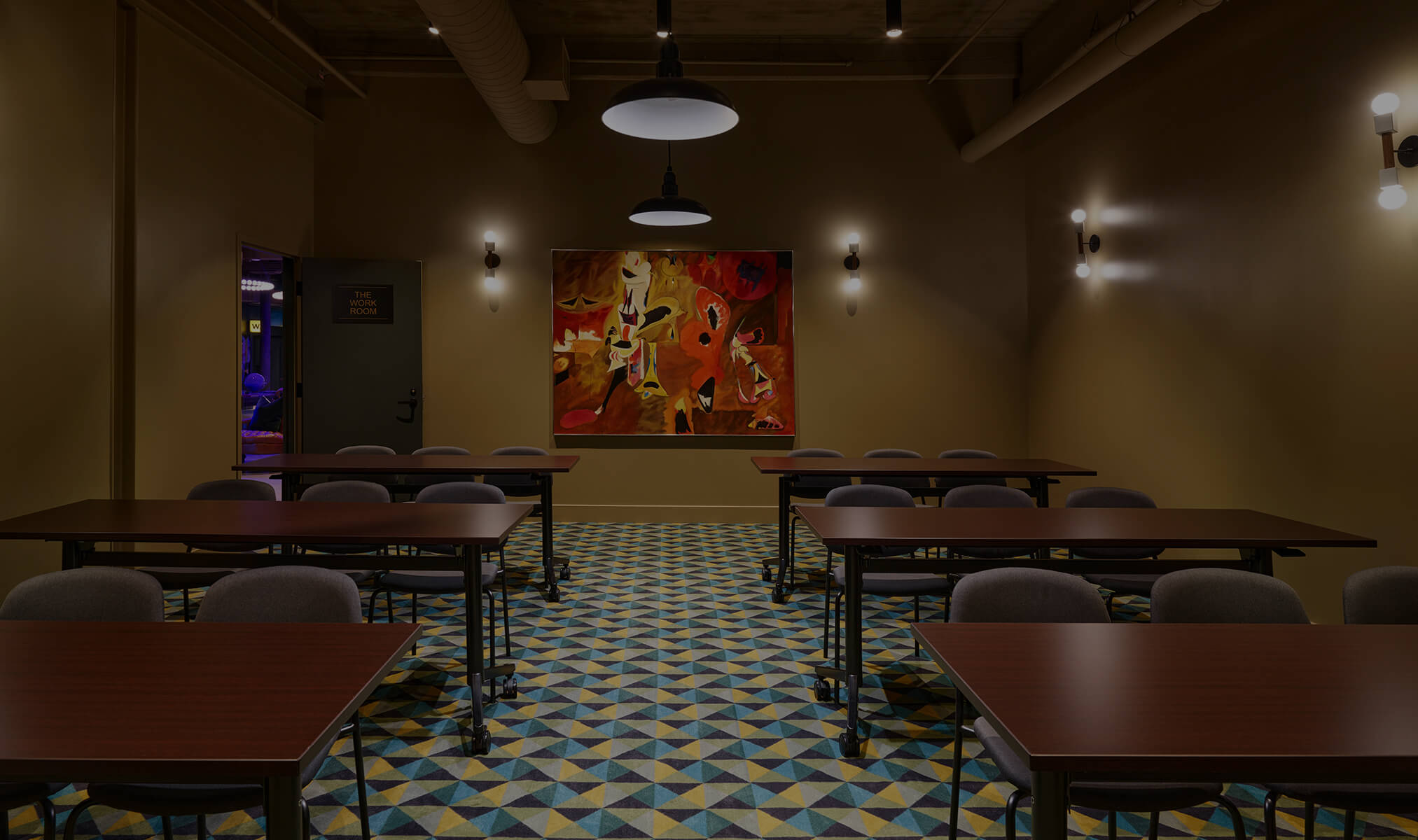 a room with tables and chairs