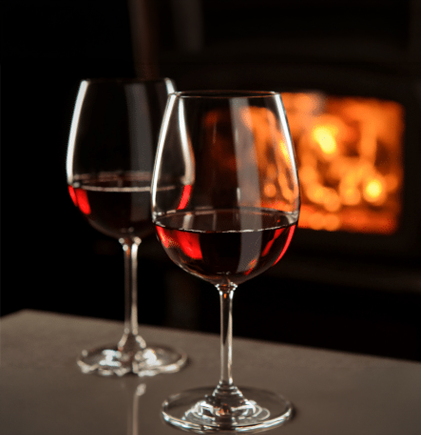 two glasses of wine on a table