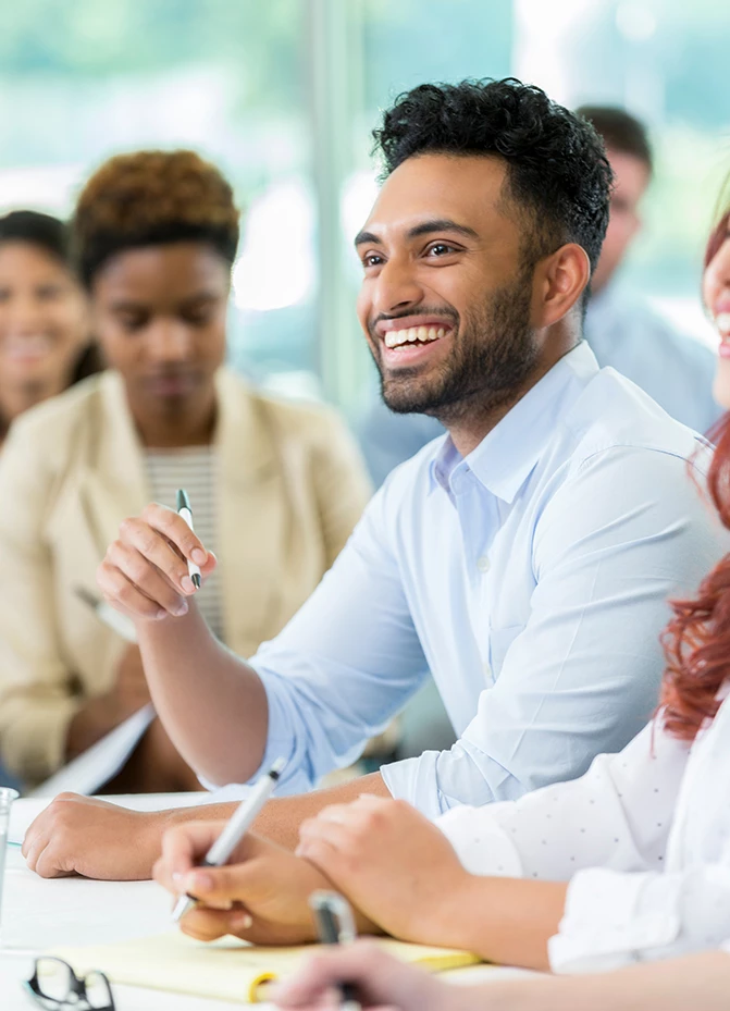 a group of people sitting at a table