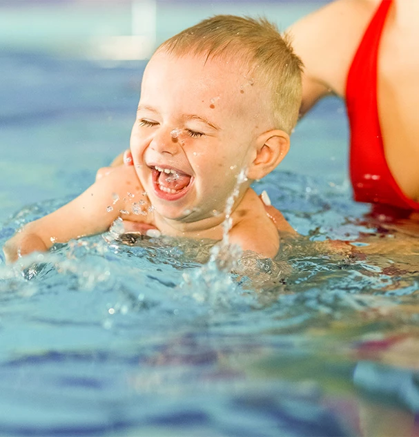 a baby in a pool