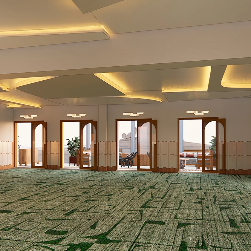 a room with green carpet and doors