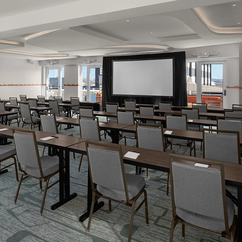 a room with tables and chairs
