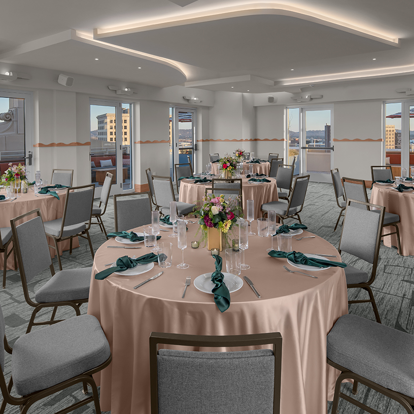 a room with tables and chairs