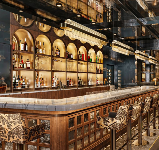 a bar with shelves and shelves of liquor