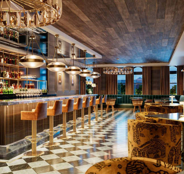 a bar with chairs and a counter