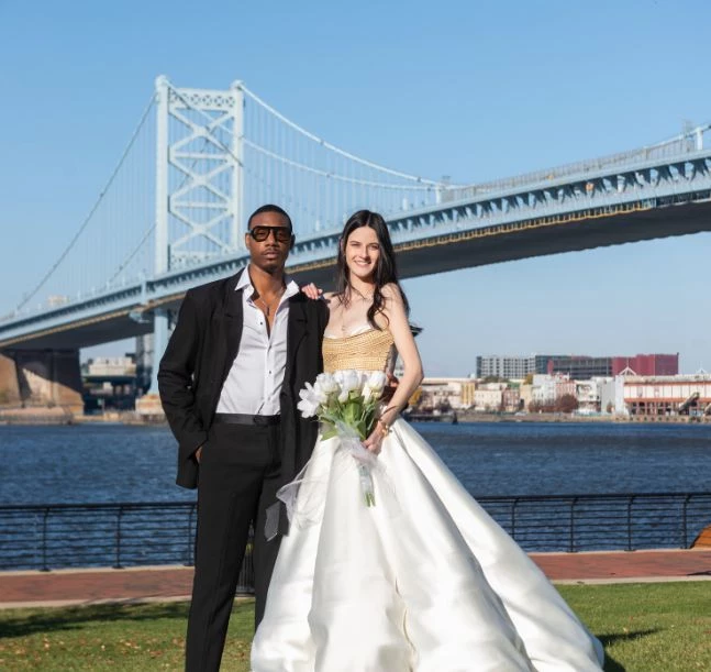 a man and woman posing for a picture