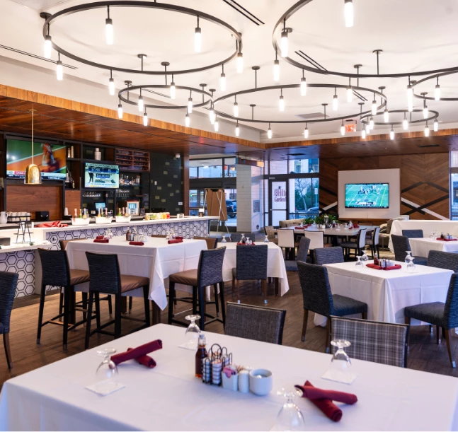 a room with tables and chairs