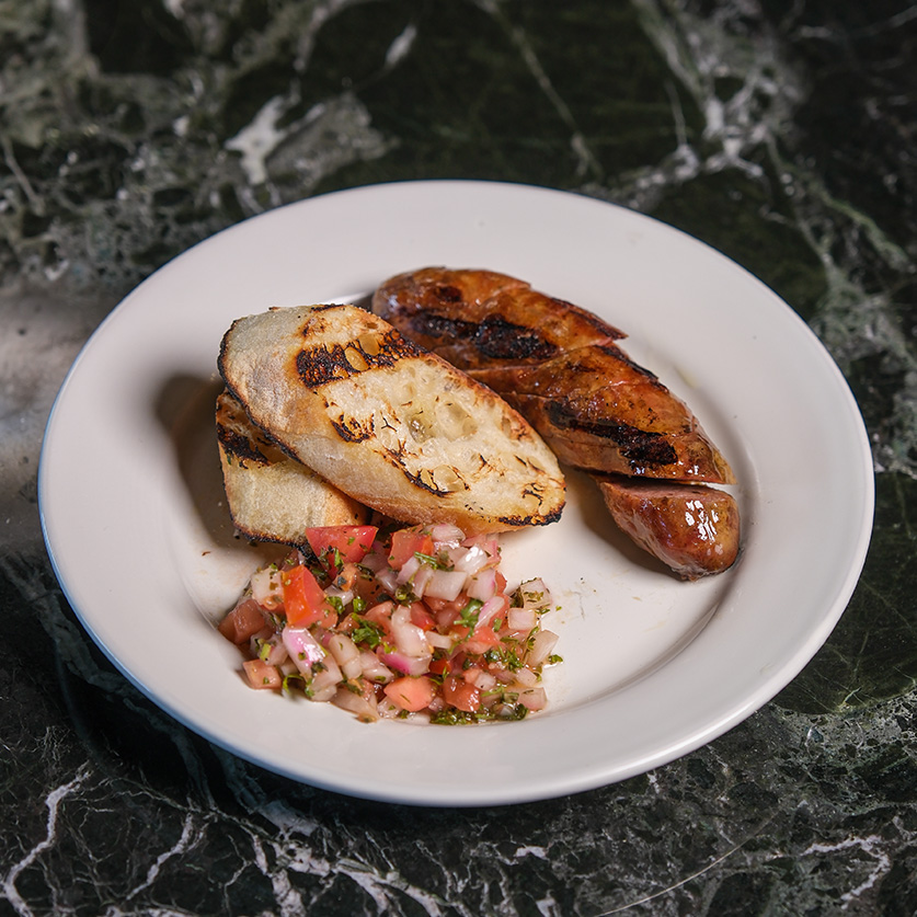 a plate of food on a marble surface