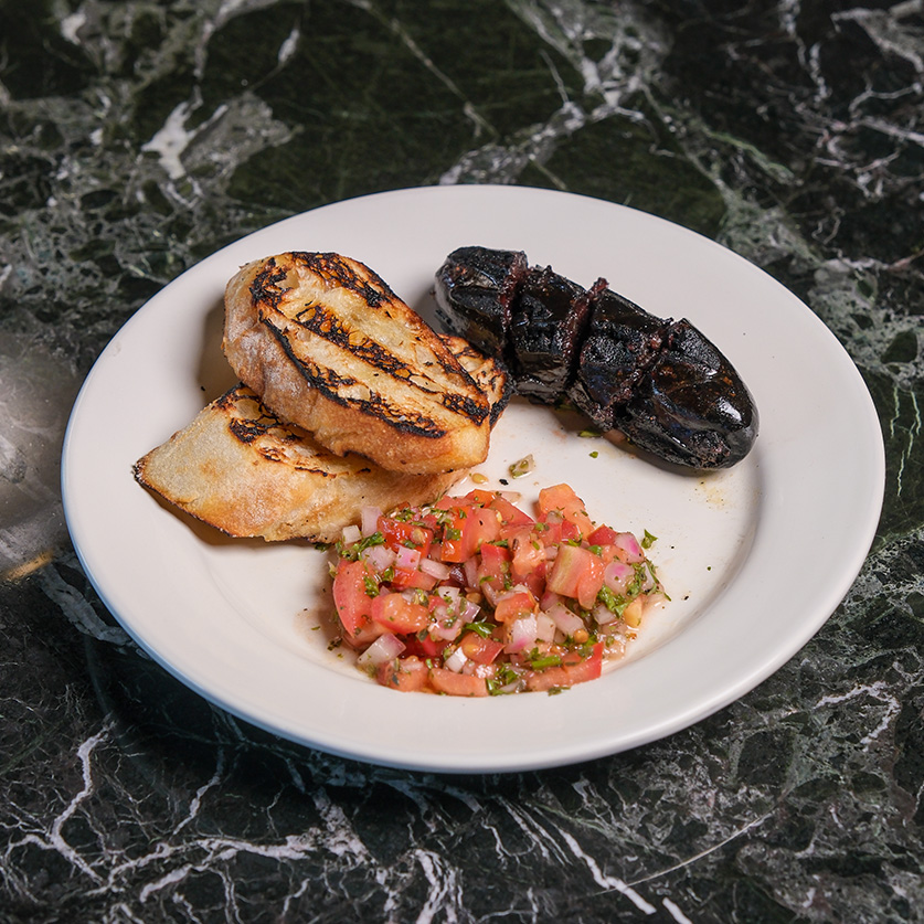 a plate of food on a marble surface