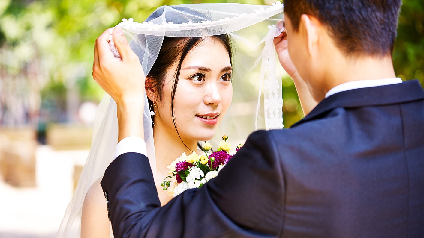 a man and woman in formal wear