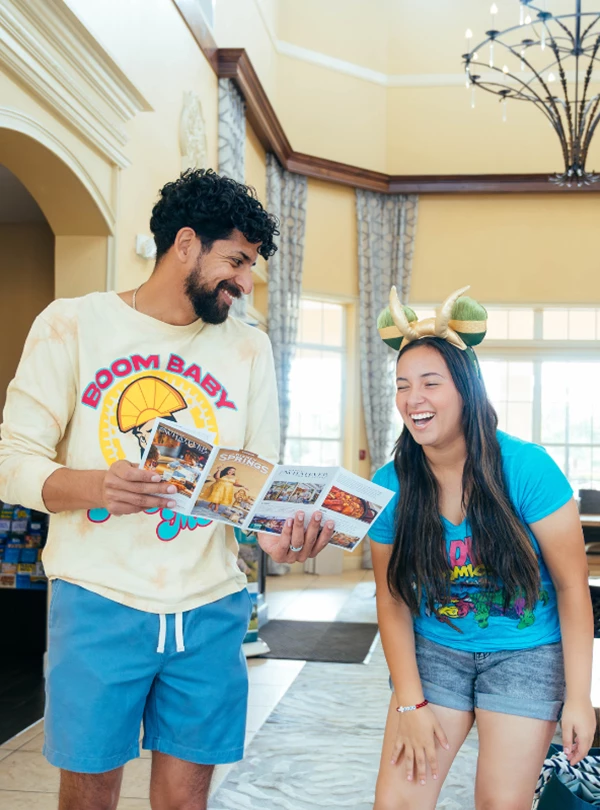 a man and woman smiling at each other