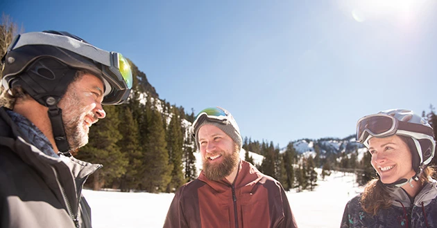 a man in a hat and goggles