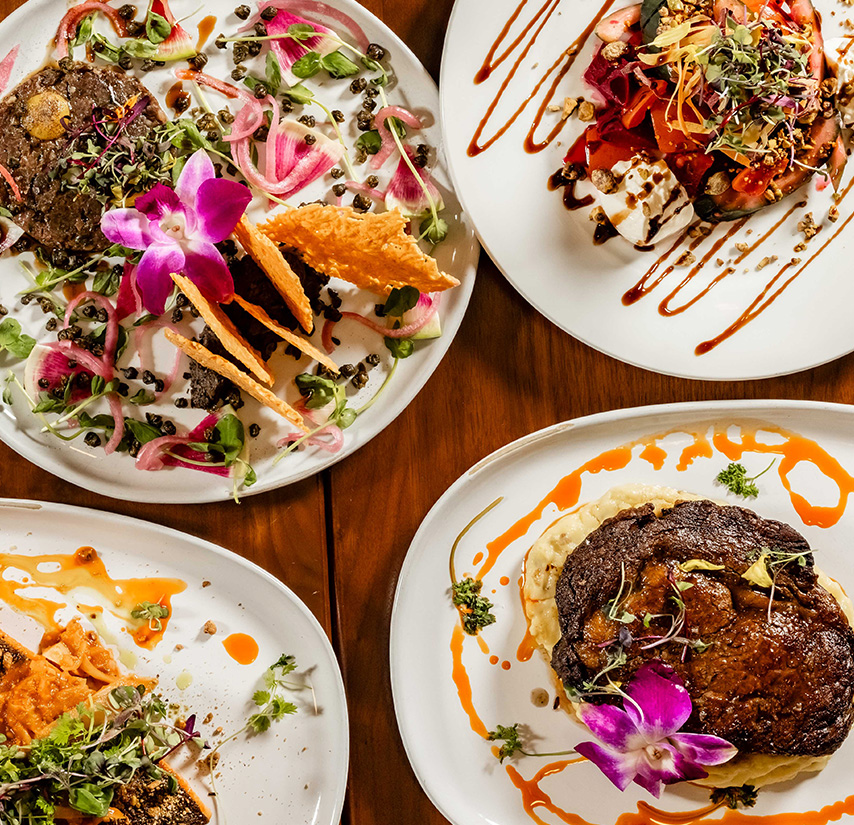 a group of plates of food