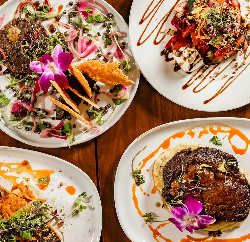 a group of plates of food