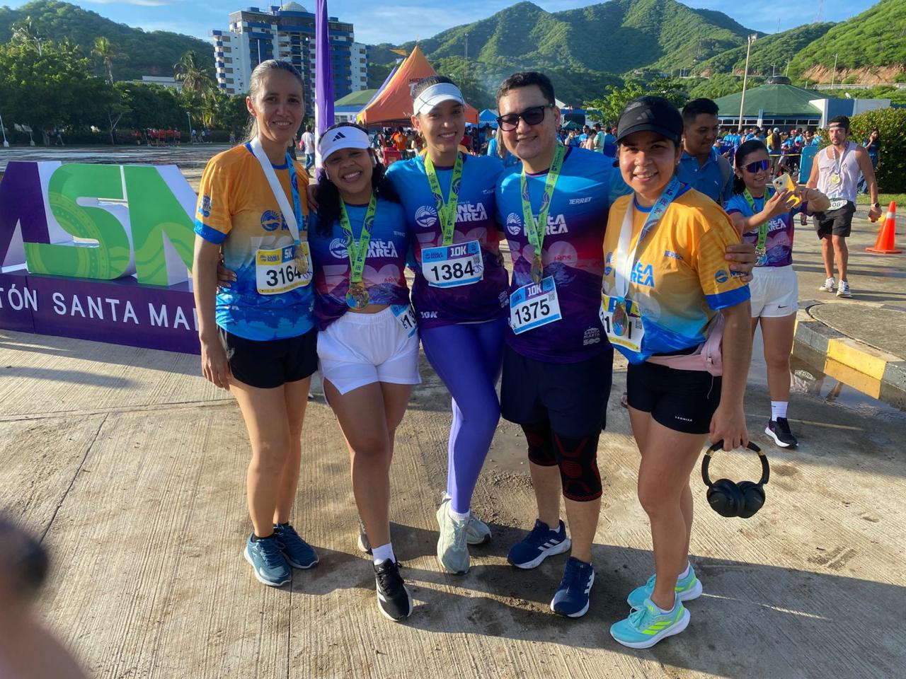 a group of people wearing matching shirts