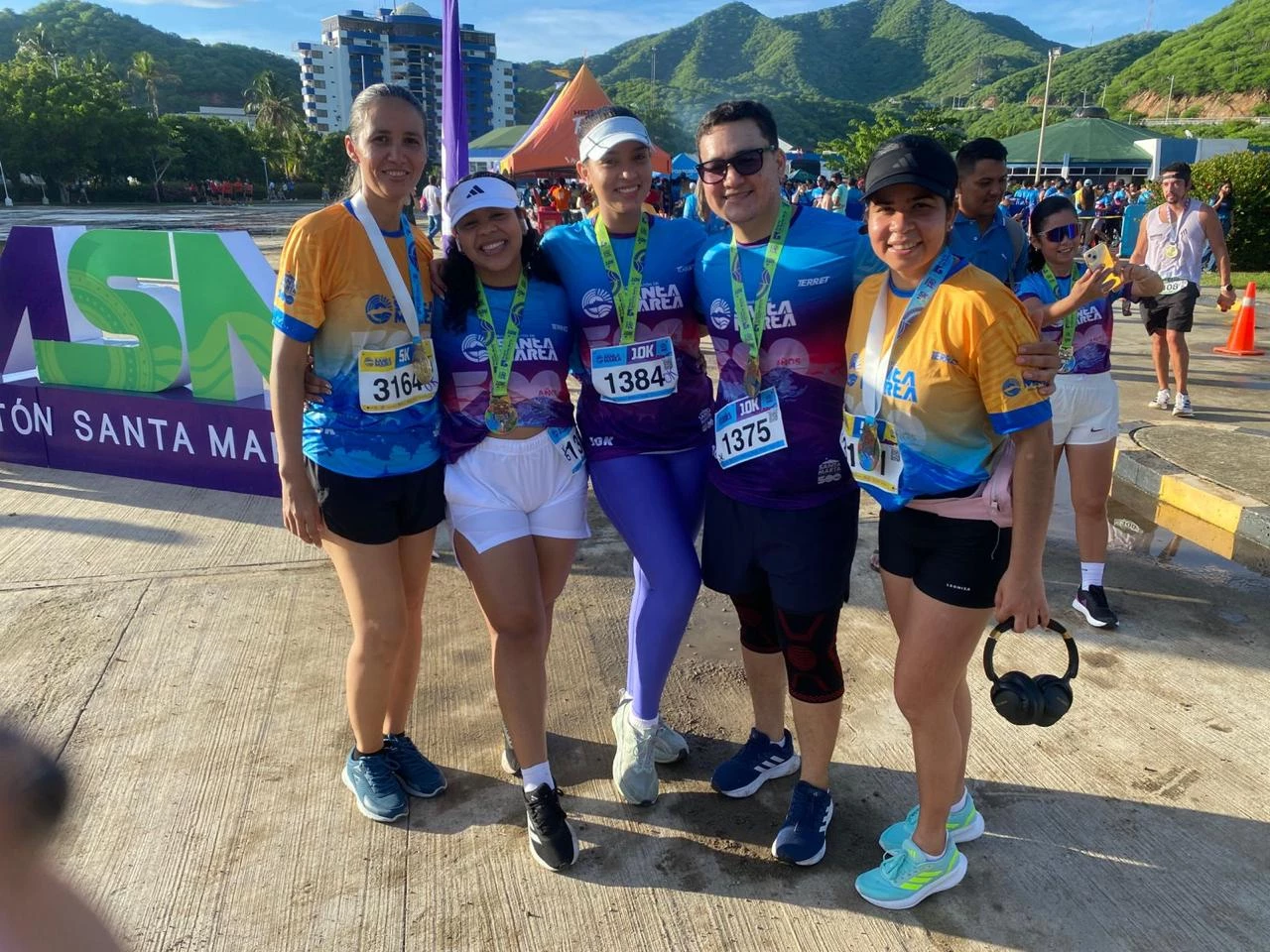 a group of people wearing matching shirts