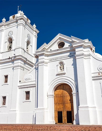 a white building with a large door