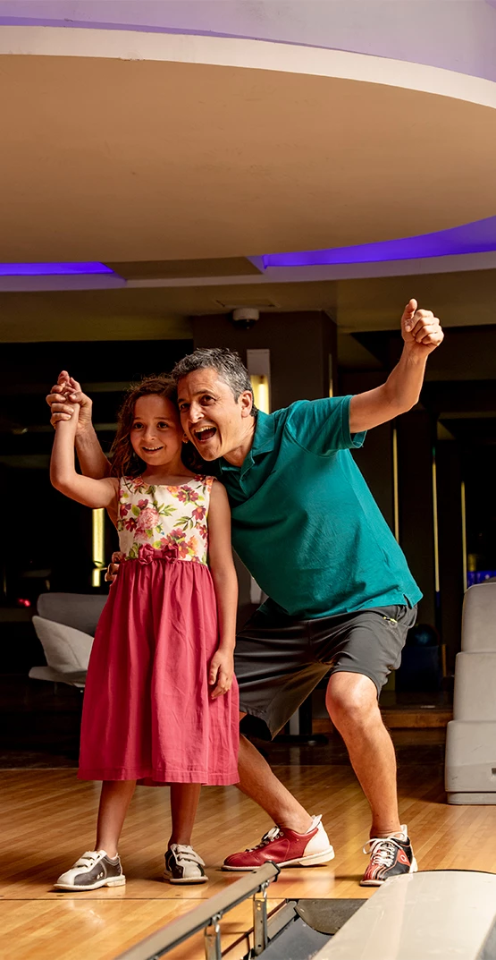 a man and girl dancing