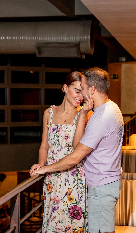a man and woman standing next to each other
