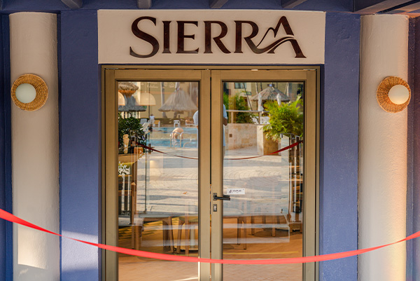 a glass doors with a sign on it