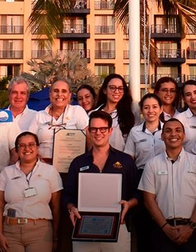 a group of people posing for a photo