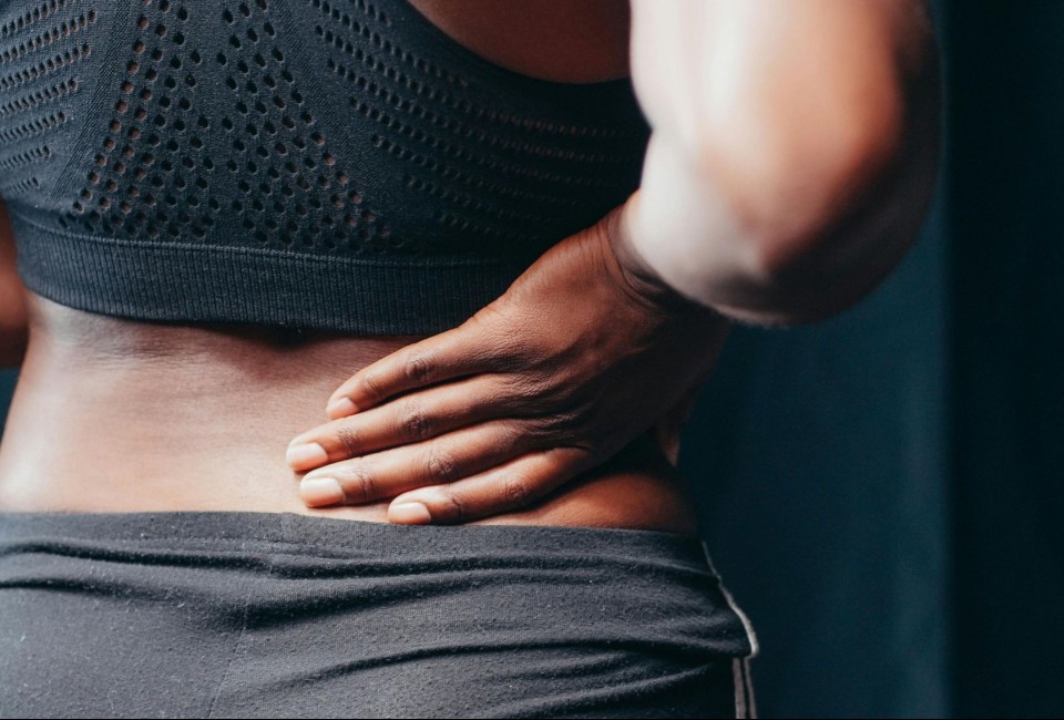 a person holding her back