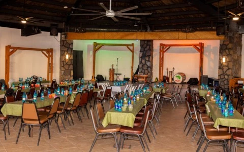 a large room with tables and chairs