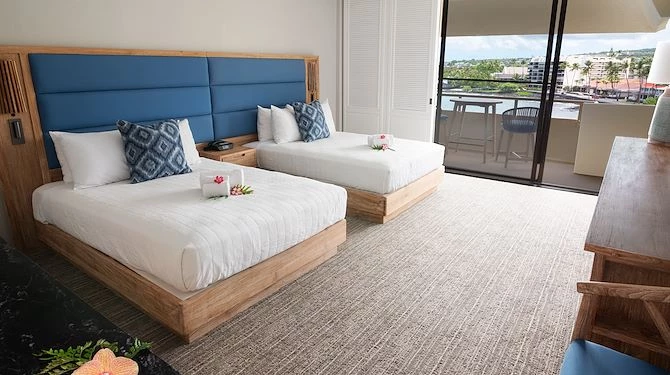 double beds with blue and wooden bed frame and blue cushions
