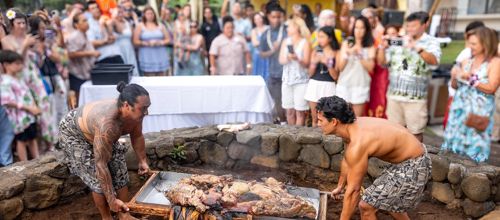 traditional unveiling of the pig at luau at Royal Kona Resort