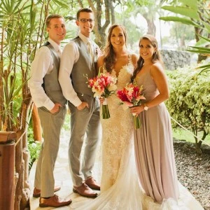 bride and groom posing with two from their bridal party