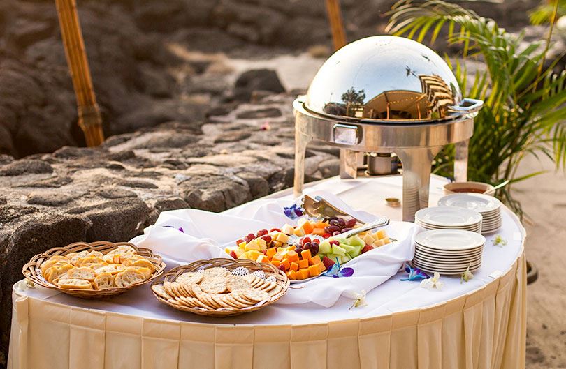 small table with dining plates set outside