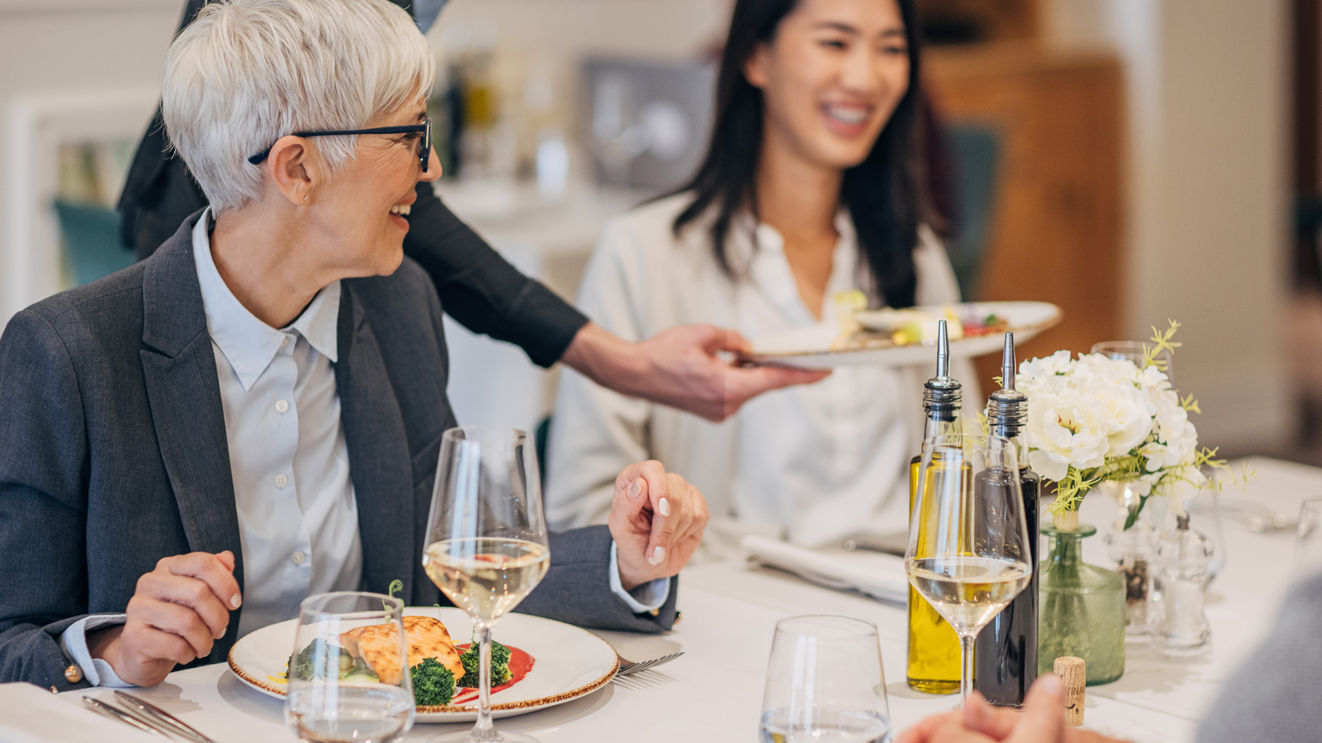 a group of people at a restaurant