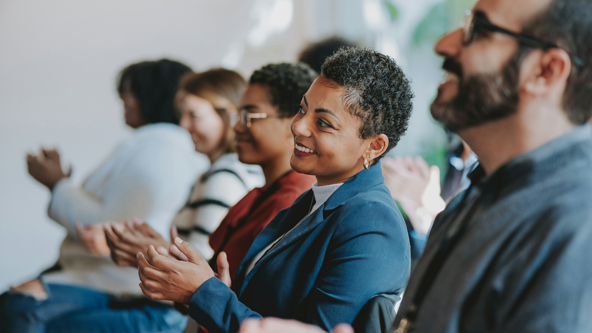 a group of people clapping
