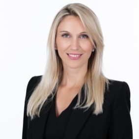 a woman in a black suit