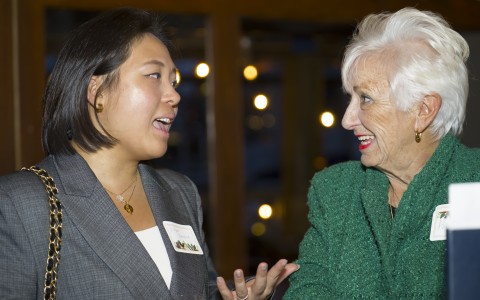 a woman talking to another woman