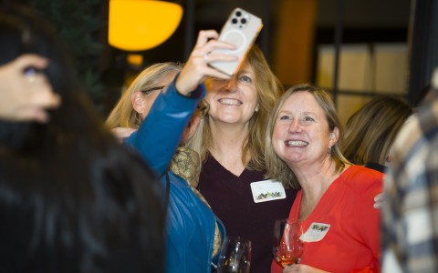 a group of women taking a selfie