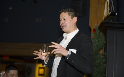 a man holding a wine glass