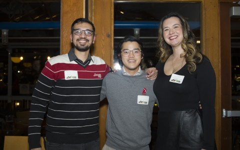 a group of people posing for a photo